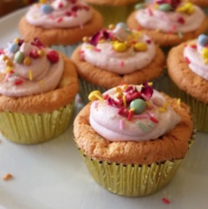 Sprinkle cloud cupcakes with matcha or vanilla soufflé sponge and healthier raspberry frosting