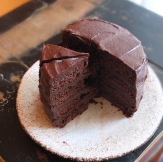 Vegan chocolate layer cake with aquafaba, spelt flour and coconut palm sugar